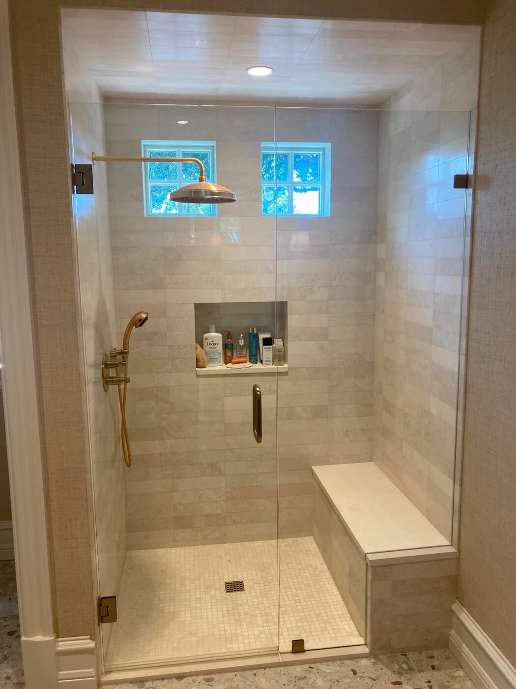 Walk-In Shower with Bench & Niche by Masterpiece Tile and Grout in the DFW area