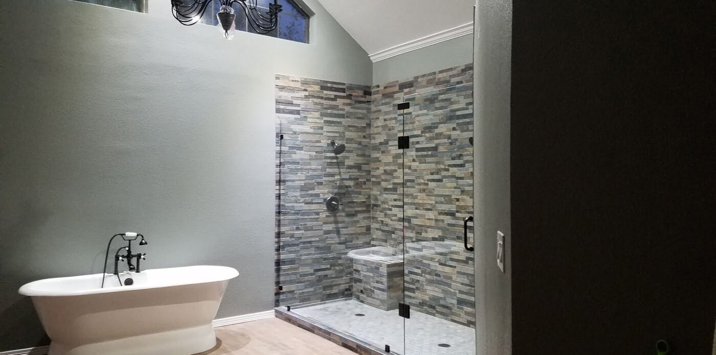 Glass Mosaic Shower & Soaking Tub by Masterpiece Tile and Grout in the DFW area